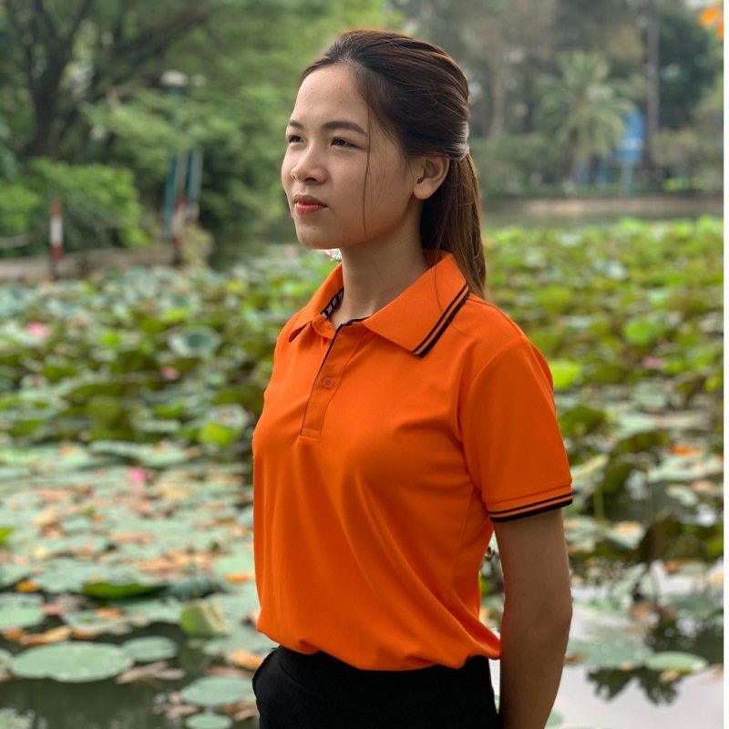 Áo polo đồng phục màu cam sang trọng, nhiệt huyết