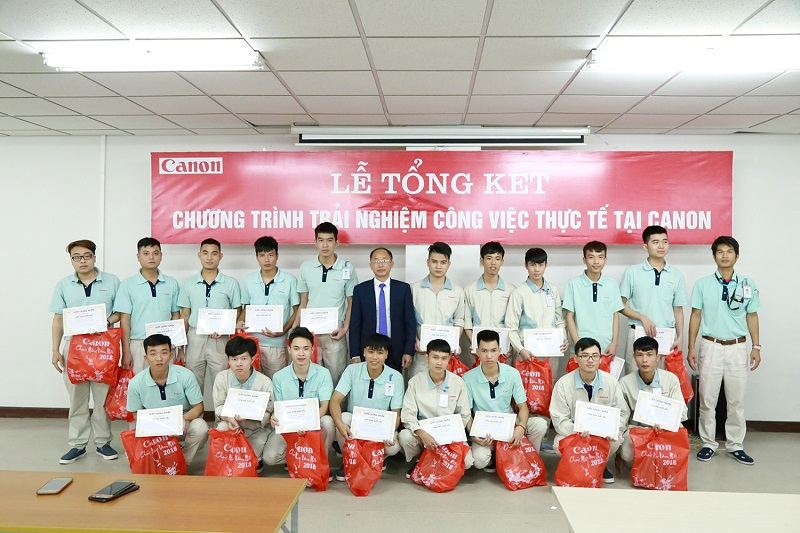 May đồng phục Canon số lượng lớn giá tốt tại Handyuni