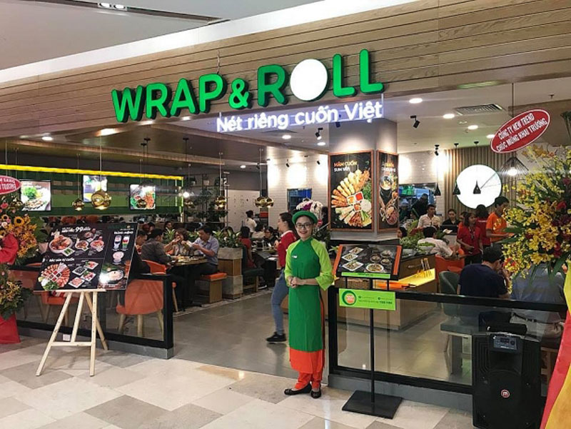 Áo dài đồng phục nhân viên tiếp đón Wrap & Roll