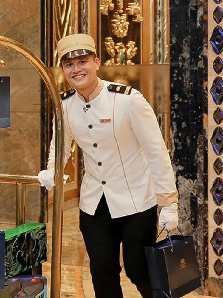 Đồng phục Bellman màu trắng phối vàng đen