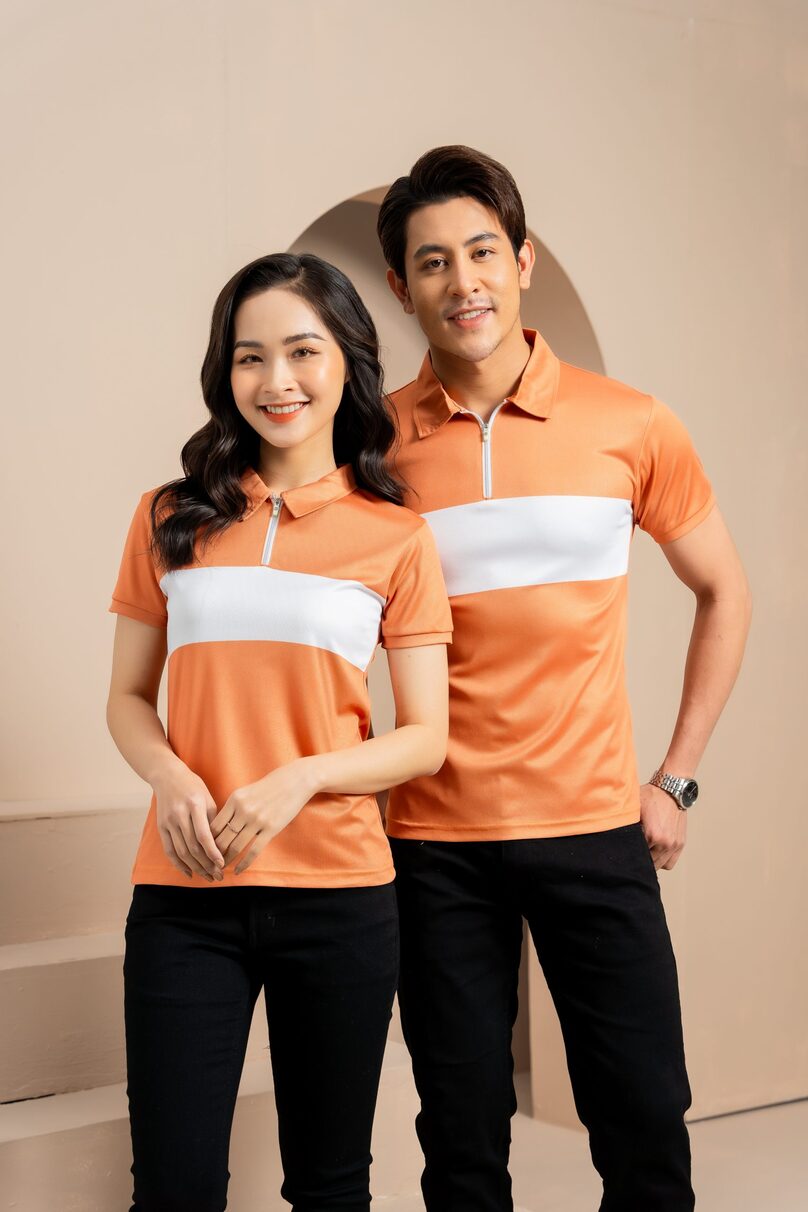 Áo polo đồng phục công ty cổ khóa kéo phối màu cam, trắng