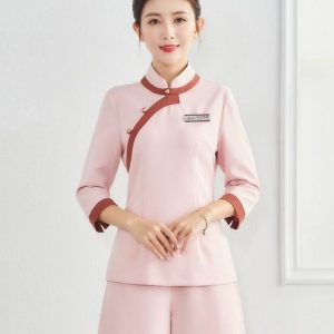 Đồng phục lễ tân spa màu hồng viền cam cuốn hút, form Regular Fit, vải Microfiber