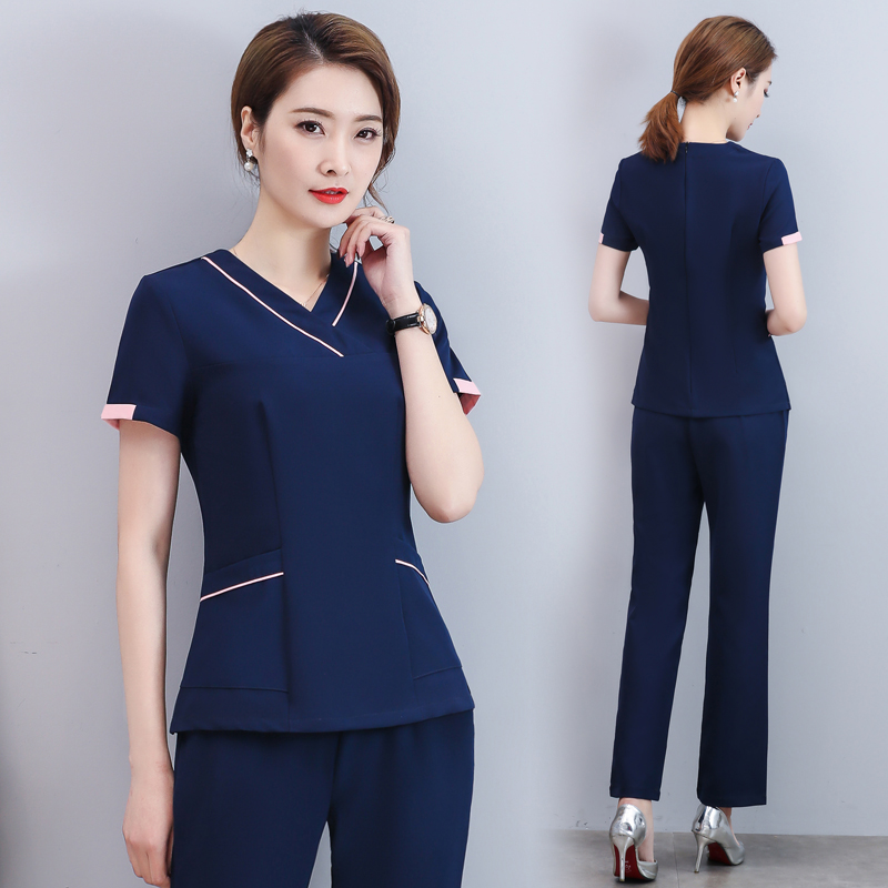 Đồng phục massage xanh tím than viền hồng phong cách form Slim Fit, vải Kaki lụa