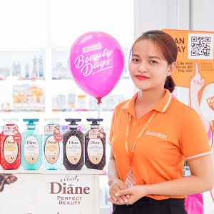 Đồng phục mỹ phẩm Guardian tay ngắn màu cam sang chảnh, vải Lacoste, form Regular Fit